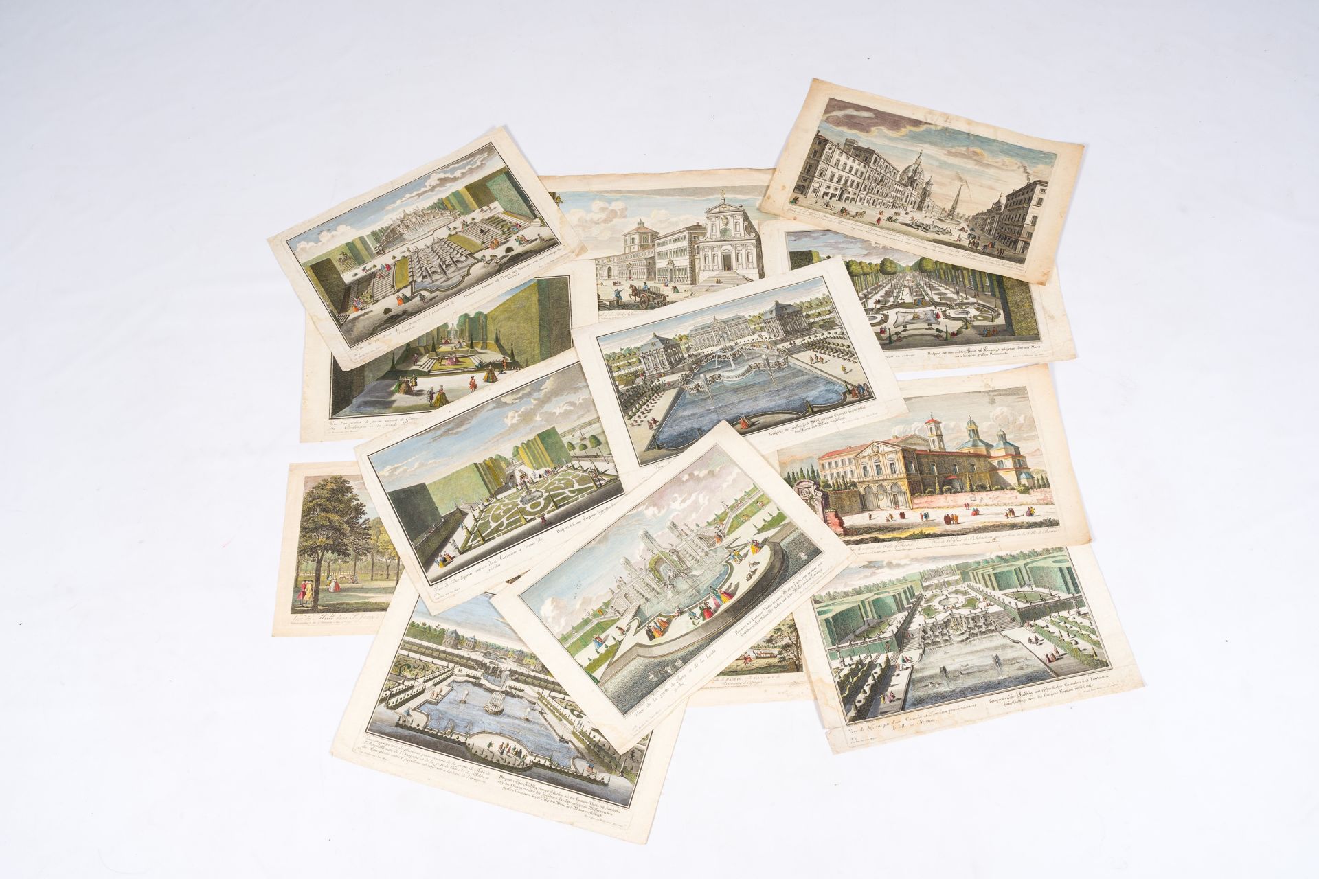 Fourteen various optical prints, a.o. views of Rome, Madrid, Paris and Mainz, hand-coloured engravin