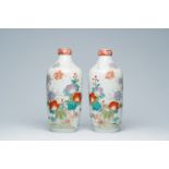 A pair of Japanese bottle-shaped Kutani vases with floral design, Meiji, 19th/20th C.