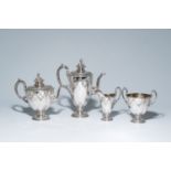 A four-piece English Victorian silver coffee and tea set with mascarons and garlands, maker's mark E