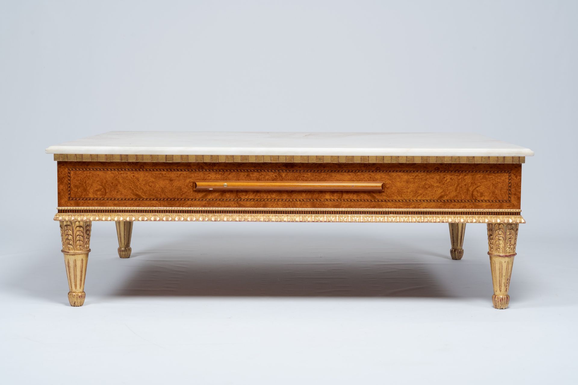 A Neoclassical partly gilt wood coffee table with marble top and four extendable plateaus, 20th C. - Image 5 of 8