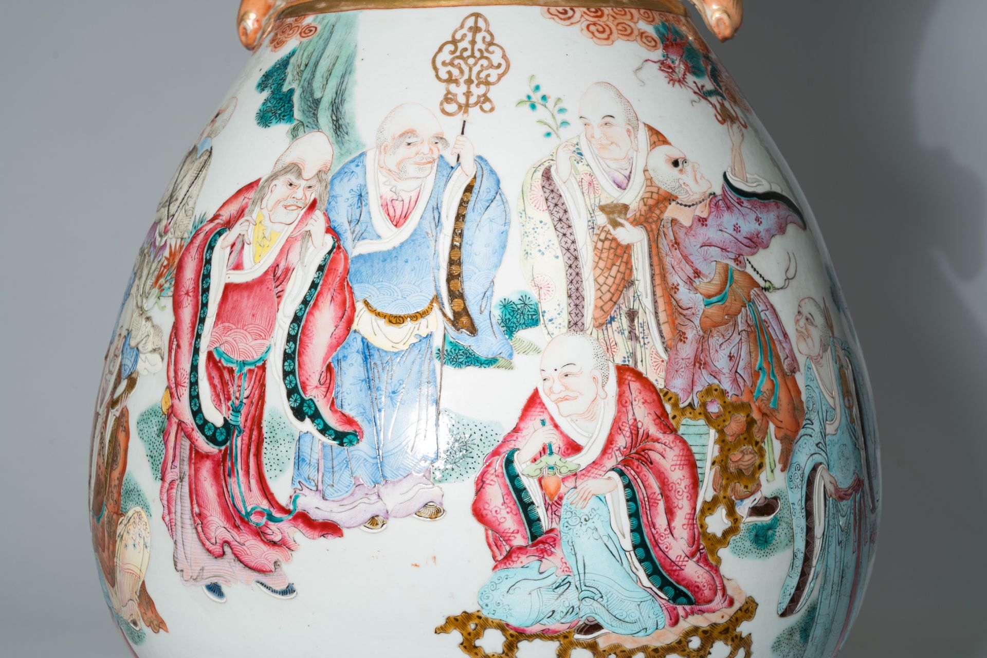 A pair of impressive Chinese famille rose 'hu' vases with the Eighteen Arhats or Luohans in a landsc - Image 13 of 13