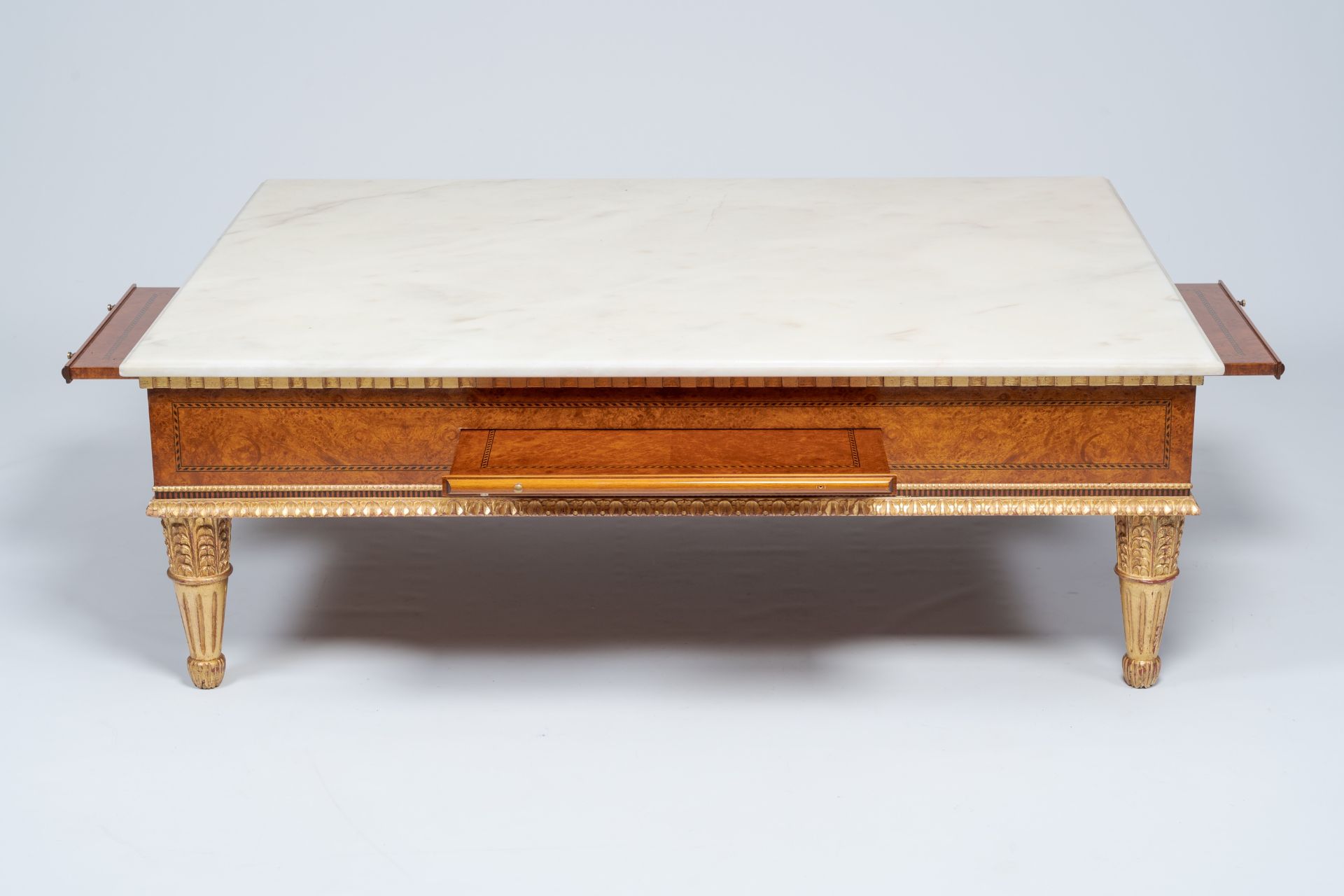 A Neoclassical partly gilt wood coffee table with marble top and four extendable plateaus, 20th C. - Image 4 of 8