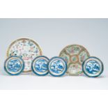 Six Chinese blue, white and famille rose plates and chargers with antiquities, floral design and ani