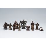 Ten Indian bronze figures of deities and a ring, 18th/19th C.