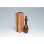 Hata Zoroku IV (1896-1984): A Japanese ochre patinated bronze gourd vase, Showa, 20th C.