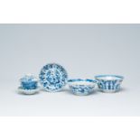 A varied collection of Chinese blue and white porcelain with floral design, landscapes and antiquiti