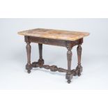An Italian carved walnut side table with marble top, 19th/20th C.