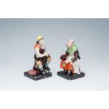 A pair of English Staffordshire 'Jobson and Nell' polychrome pottery figures, probably workshop Enoc