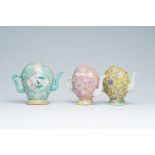 Three Chinese famille rose peach-shaped cadogan teapots with floral design, 19th C.