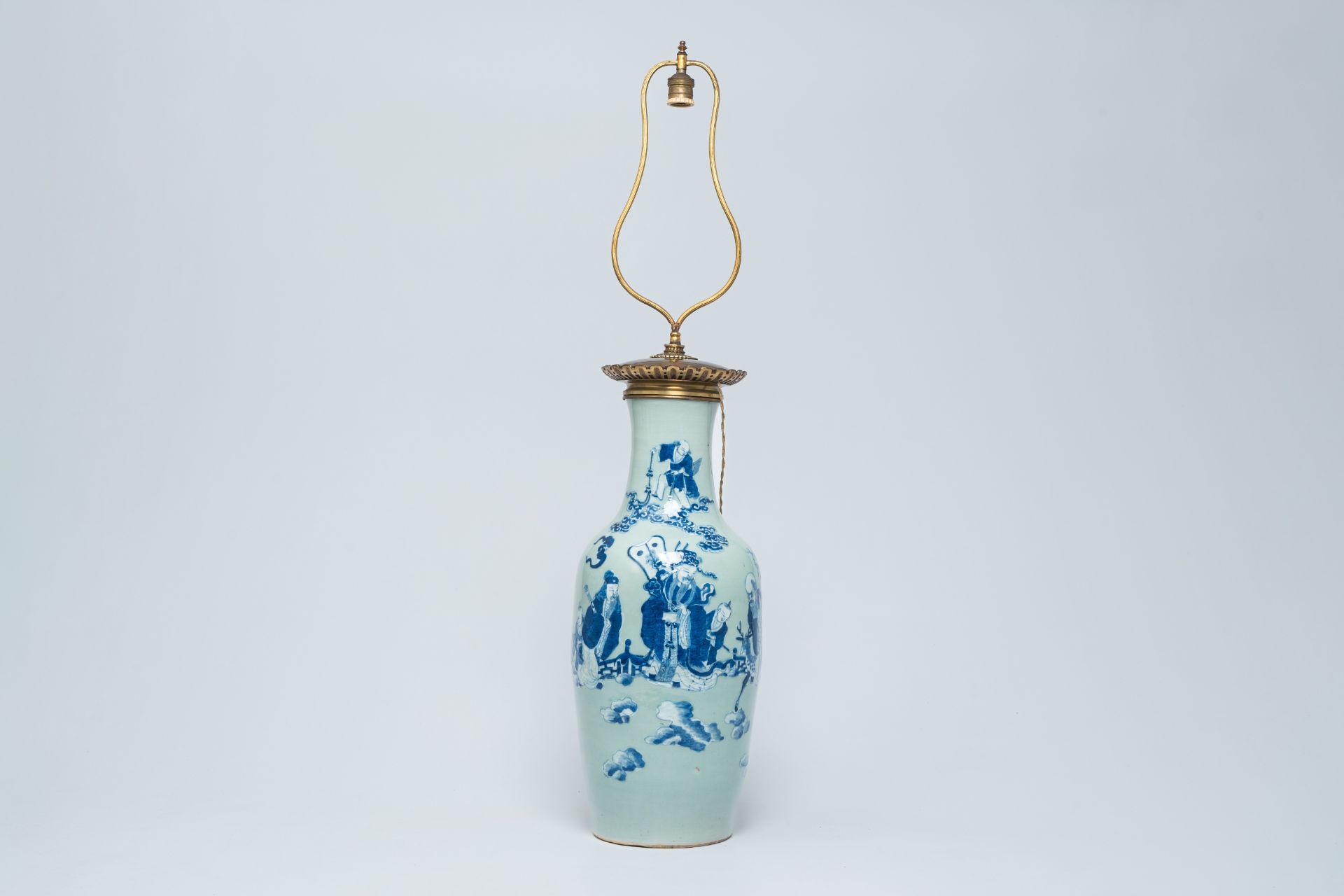 A Chinese blue and white celadon ground vase with the 'Star God' figures and their servants mounted