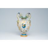 An Italian polychrome maiolica vase with mascarons and snake-shaped handles, Cantagalli, 19th C.