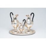 A four-piece French-Belgian silver coffee set with floral relief design, 19th/20th C.