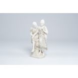 An Italian alabaster group of a man courting a lady, 19th/20th C.