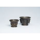 Two French bronze mortars with relief design, 17th C.