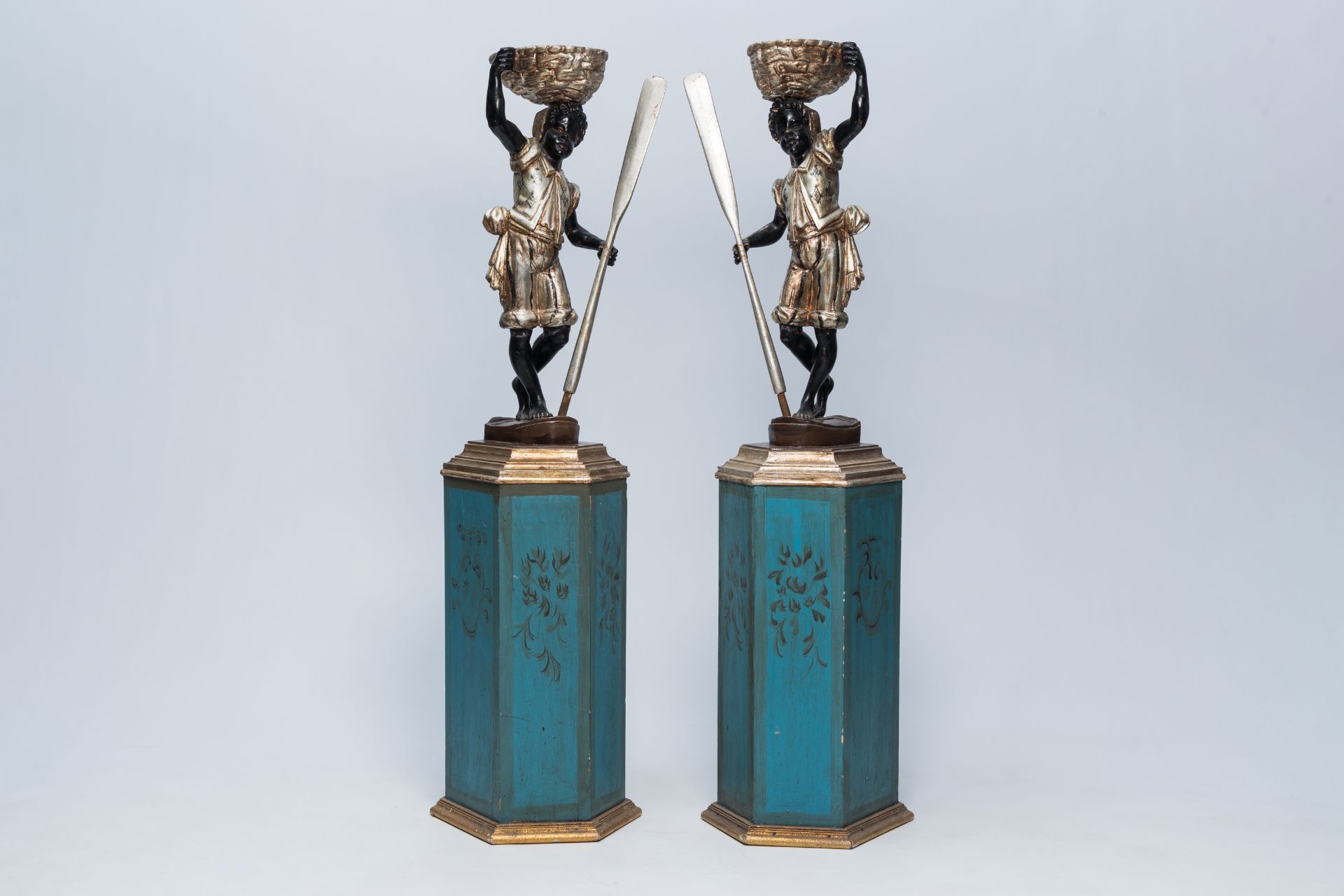 A pair of large Venetian carved and polychrome painted wood 'blackamoor' plant stands, 20th C.