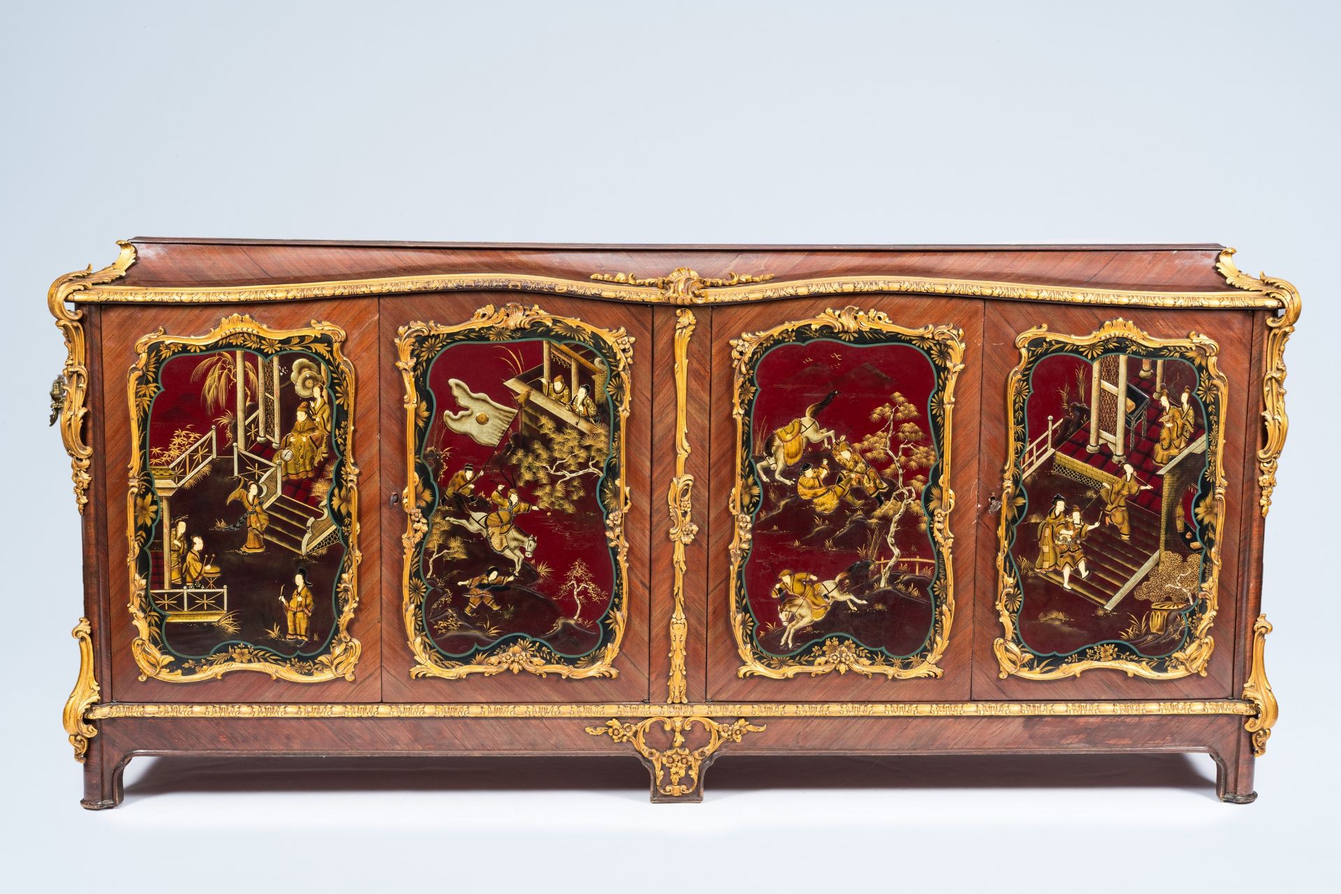 A French gilt wood and mahogany veneered four-door sideboard with oriental style lacquer, 20th C. - Image 2 of 10