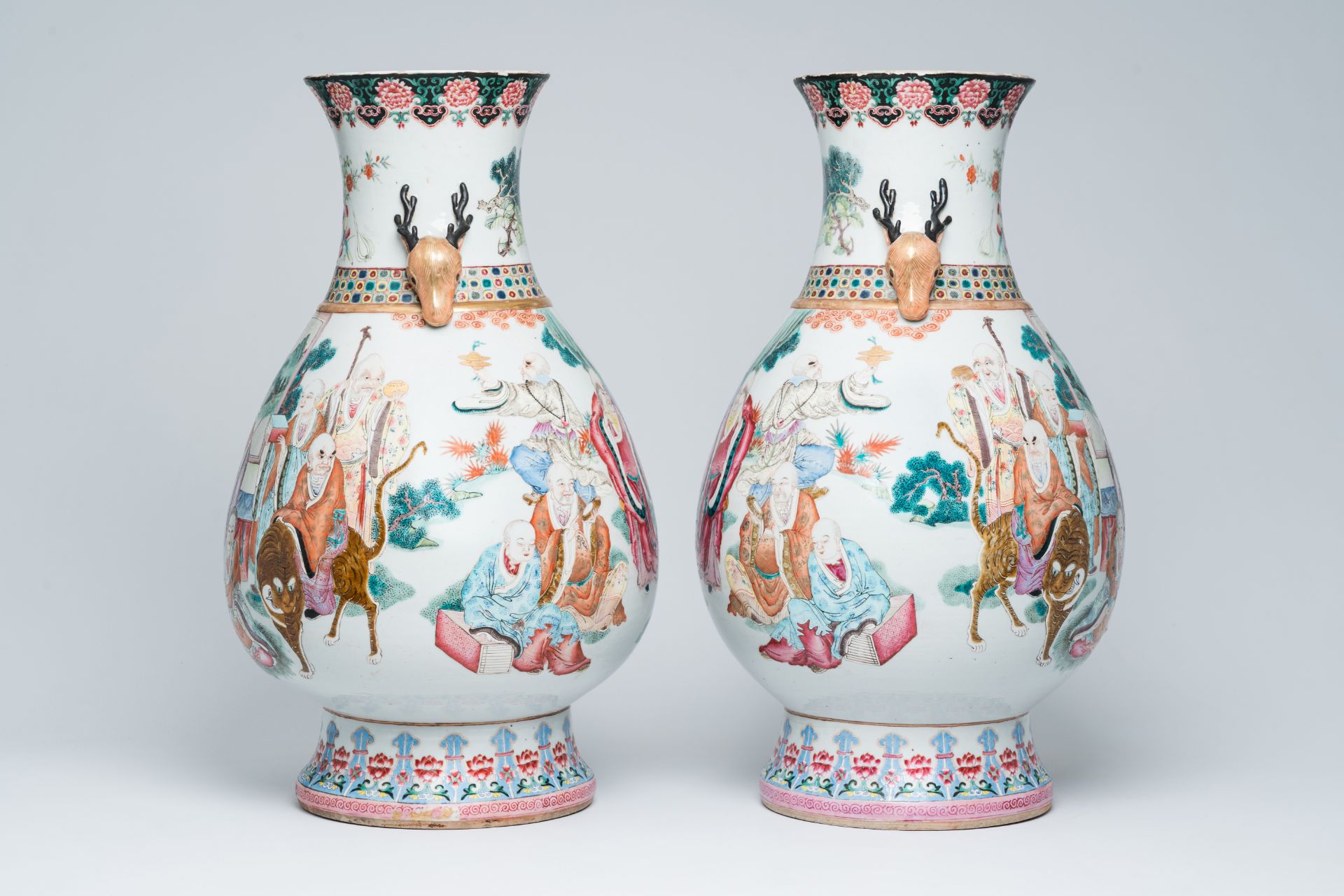 A pair of impressive Chinese famille rose 'hu' vases with the Eighteen Arhats or Luohans in a landsc - Image 2 of 13