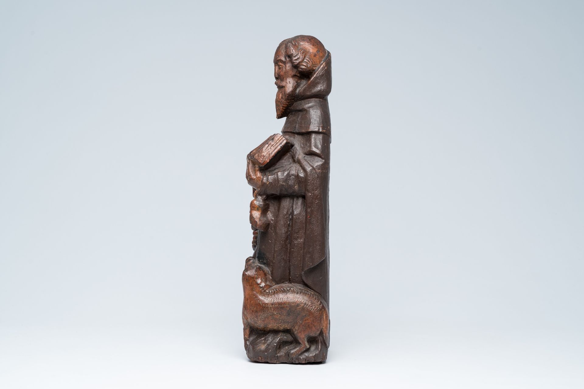 A Flemish carved oak figure of Saint Anthony the Great with traces of polychromy, 15th/16th C. - Image 2 of 6