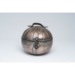 A round Islamic tinned copper food container, 19th/20th C.