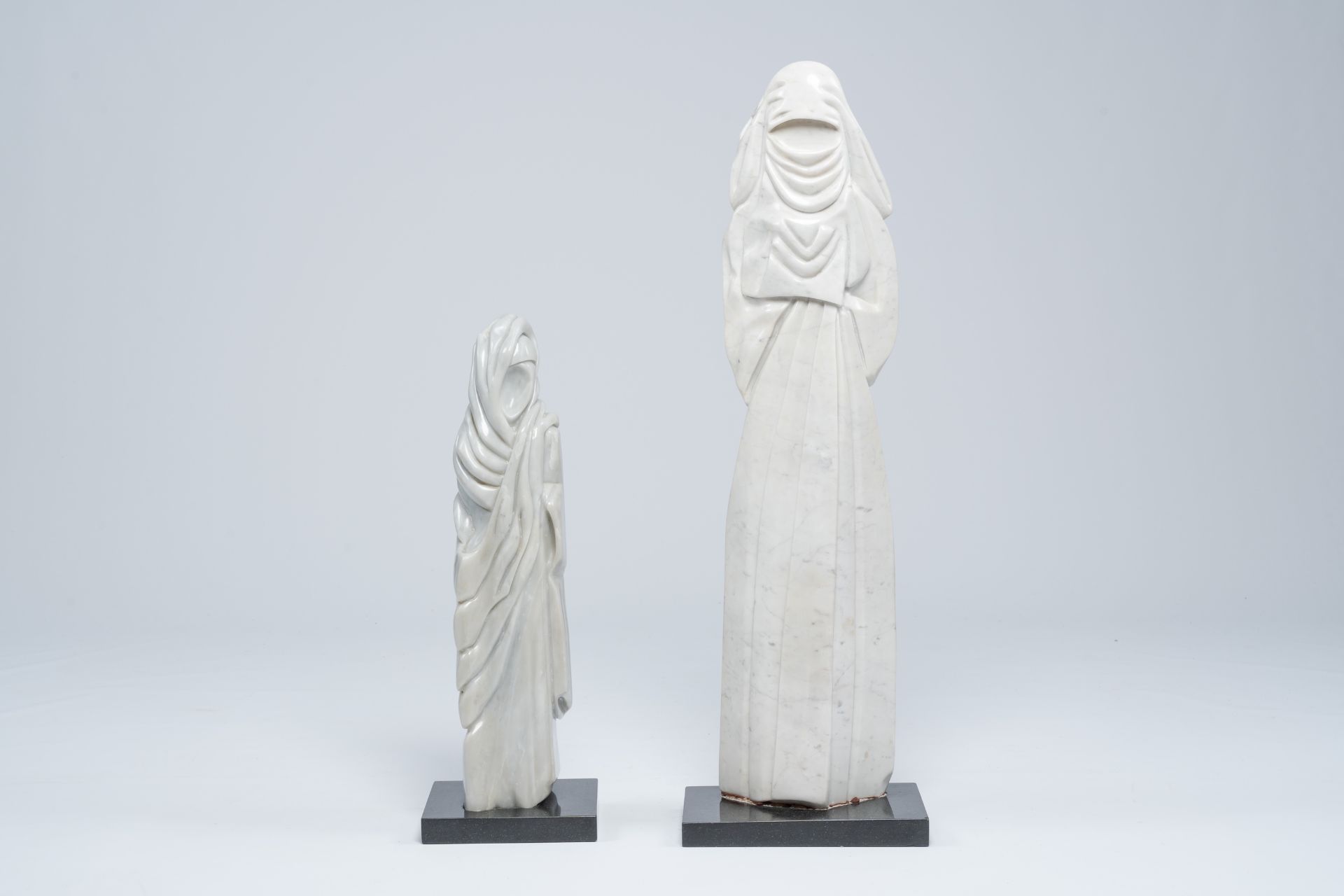 Mani (20th C.): Two marble figures of veiled ladies, dated 1987