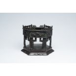 A Japanese hexagonal bronze stand, Edo, 17th C.