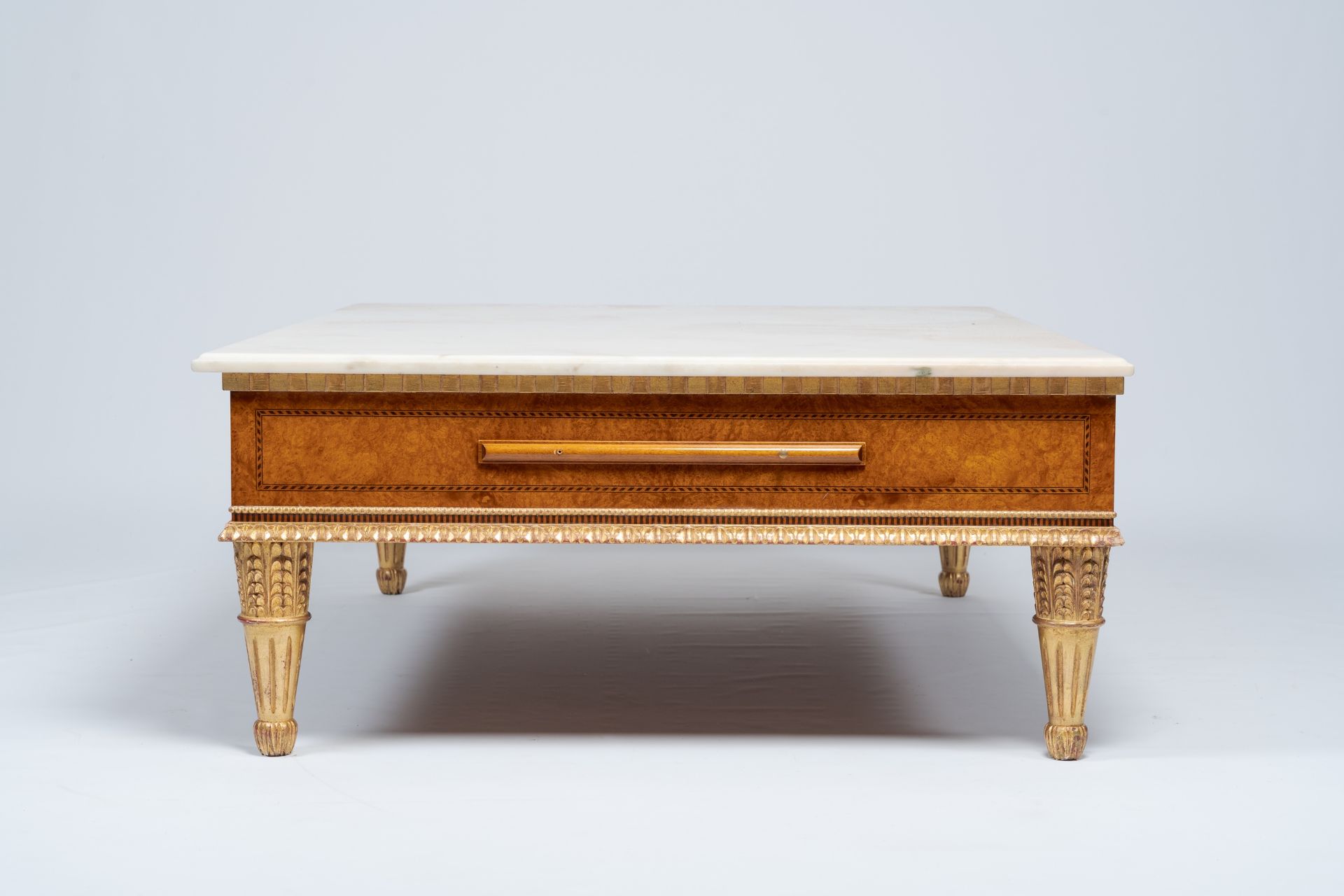 A Neoclassical partly gilt wood coffee table with marble top and four extendable plateaus, 20th C. - Image 6 of 8