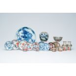 A varied collection of blue and white, famille rose and Imari-style porcelain, Kangxi and later