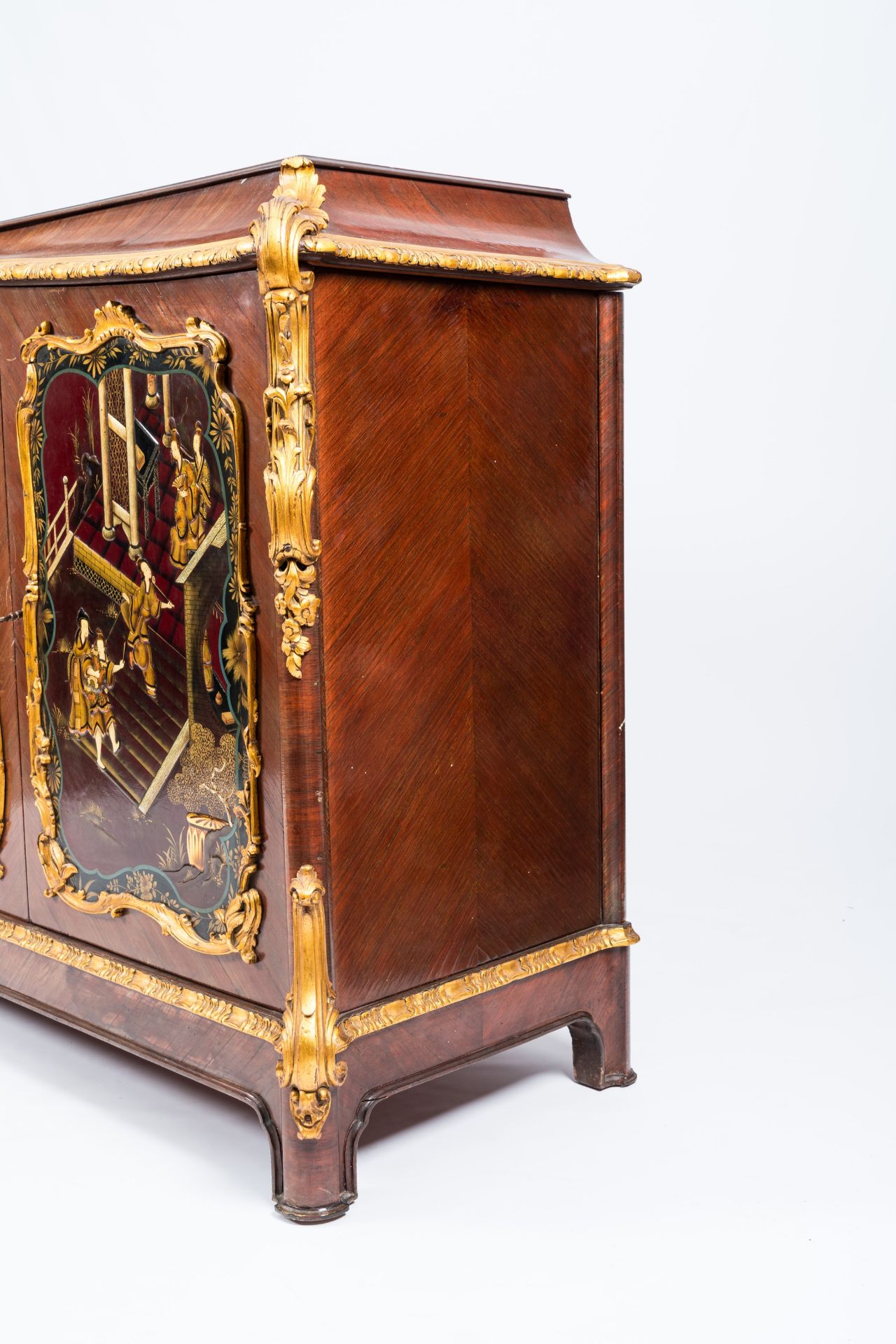 A French gilt wood and mahogany veneered four-door sideboard with oriental style lacquer, 20th C. - Image 5 of 10