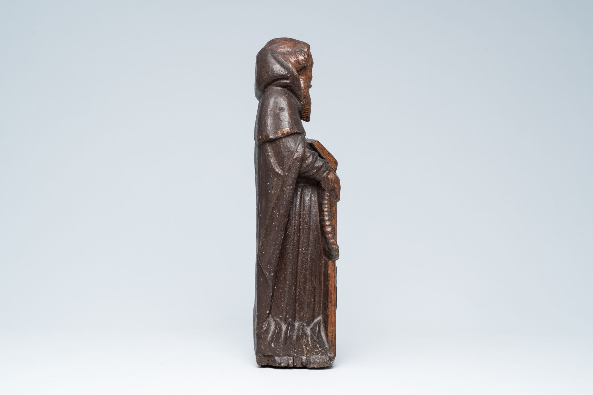 A Flemish carved oak figure of Saint Anthony the Great with traces of polychromy, 15th/16th C. - Image 4 of 6
