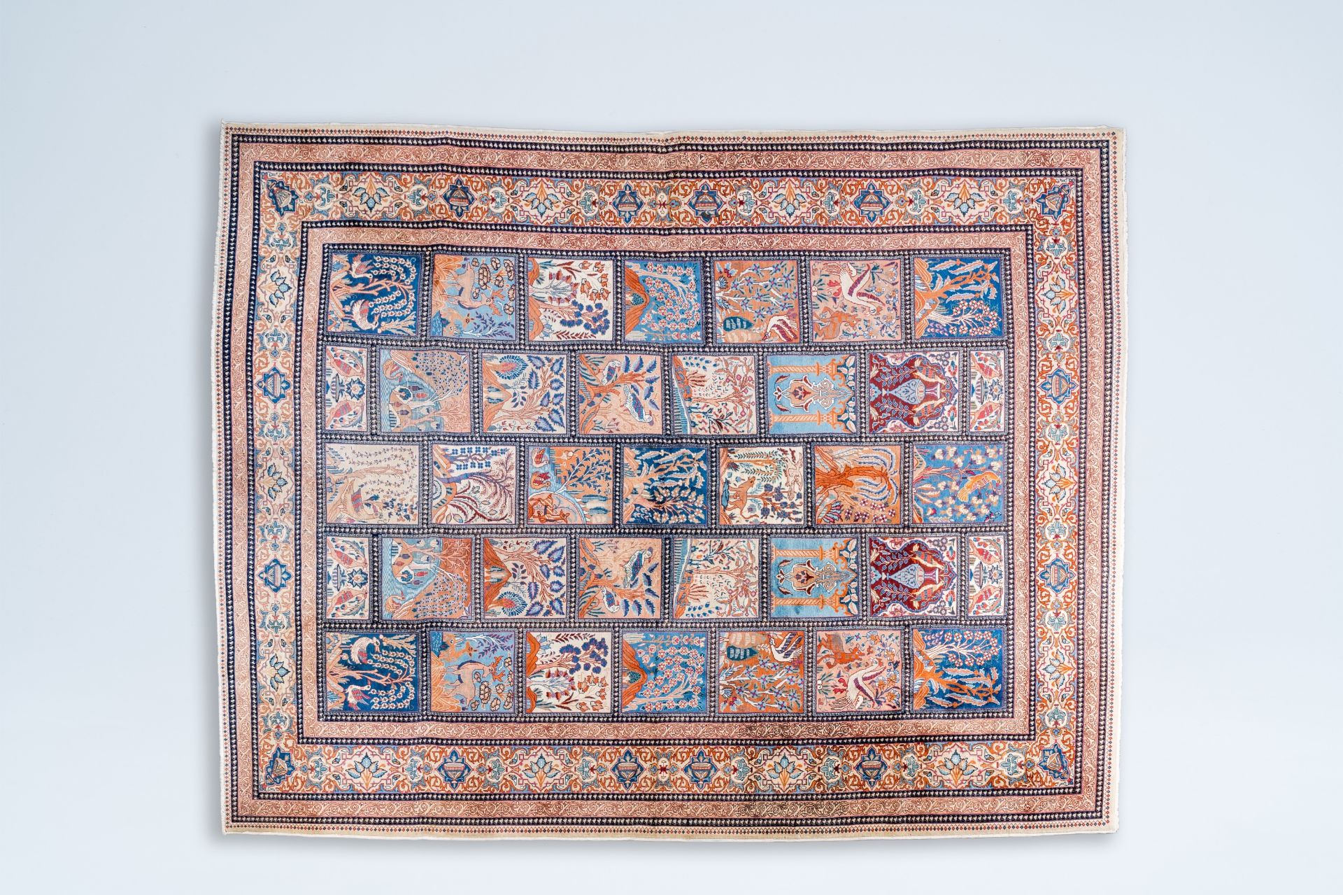 A Persian Bakhtiari rug with animals and floral design, wool on cotton, Iran, 20th C.