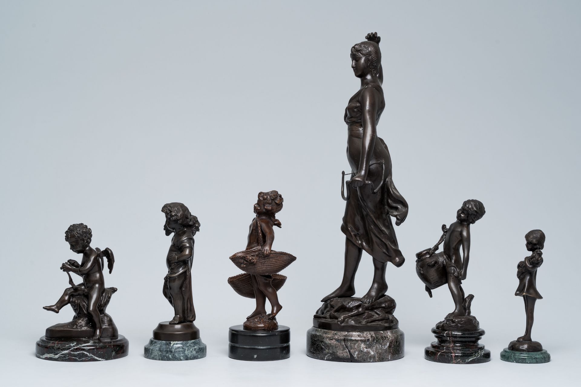 A varied collection of six French bronze sculptures on a marble base, 20th C. - Image 3 of 13