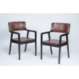 Olivier De Schrijver (1958): A pair of Brighton armchairs in double-sided brown leather and black ti