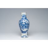 A Chinese baluster shaped blue and white vase with a court scene, 19th C.