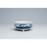 A Chinese blue and white tripod censer with floral design, Qing