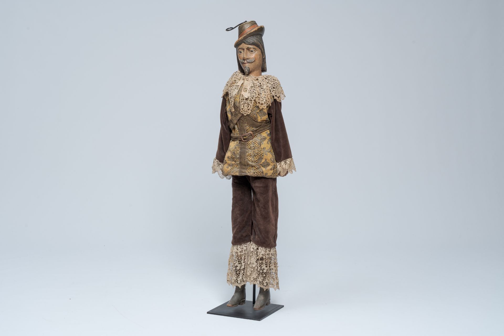 A probably Liege polychrome wood marionette doll in 17th-C. costume with lace, 19th C.