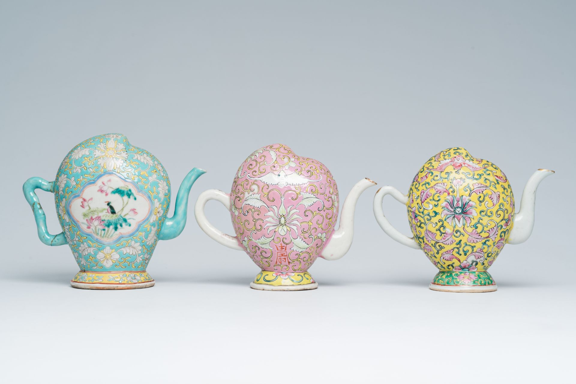 Three Chinese famille rose peach-shaped cadogan teapots with floral design, 19th C. - Image 2 of 7