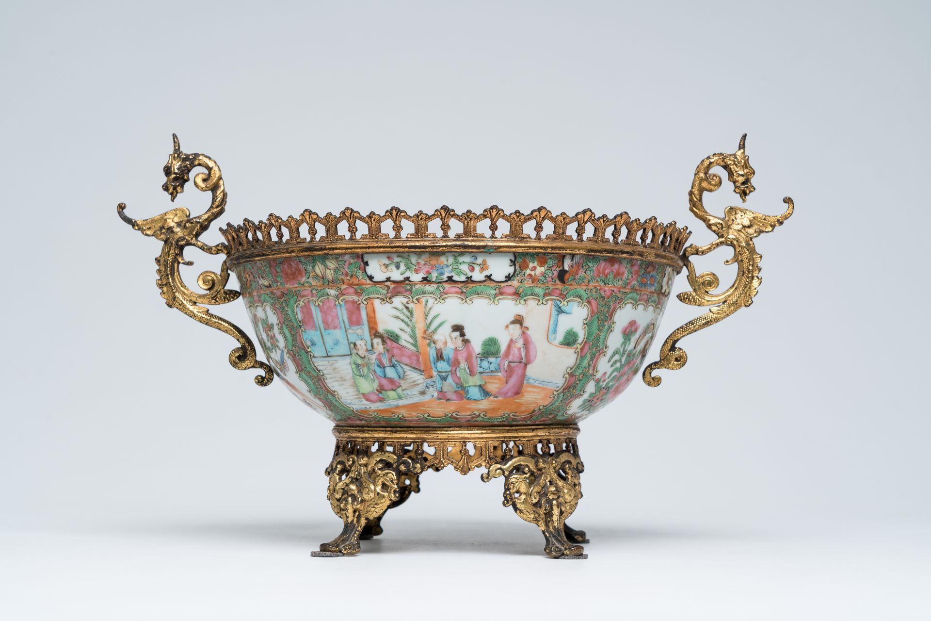 A Chinese Canton famille rose gilt mounted bowl with palace scenes, 19th C. - Image 6 of 7