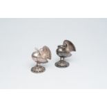 A pair of Indian silver plated water sprinklers in the shape of exotic birds with a branch in their