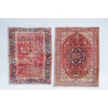 Two Persian Heriz rugs with floral design, wool on cotton, 20th C.