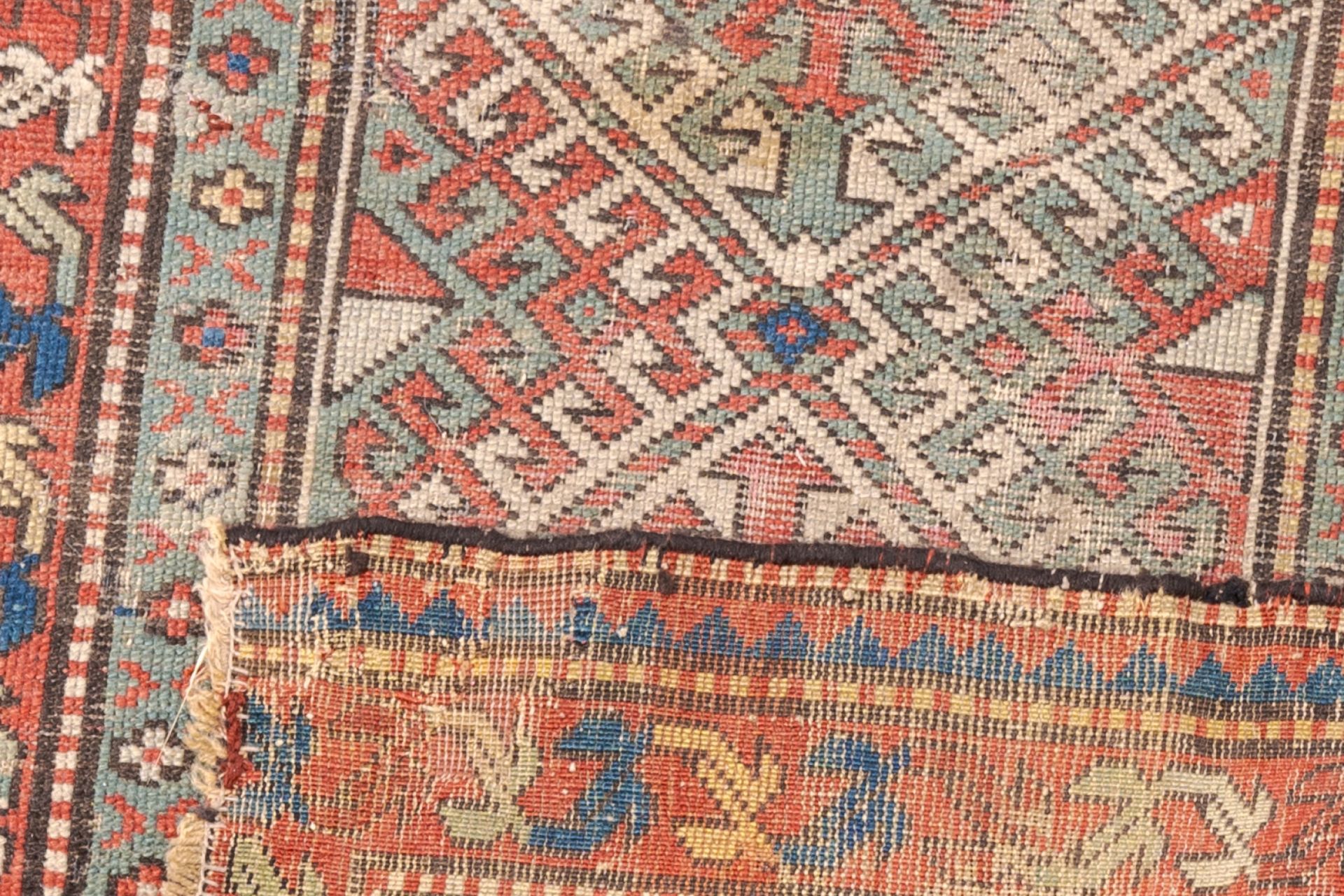 Two Caucasian carpets with geometric design and an Oriental Qom (Qum/Ghom) rug, wool on cotton, 19th - Image 5 of 5