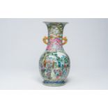 A large Chinese famille rose turquoise ground bottle vase with dragons and cartouches with animated