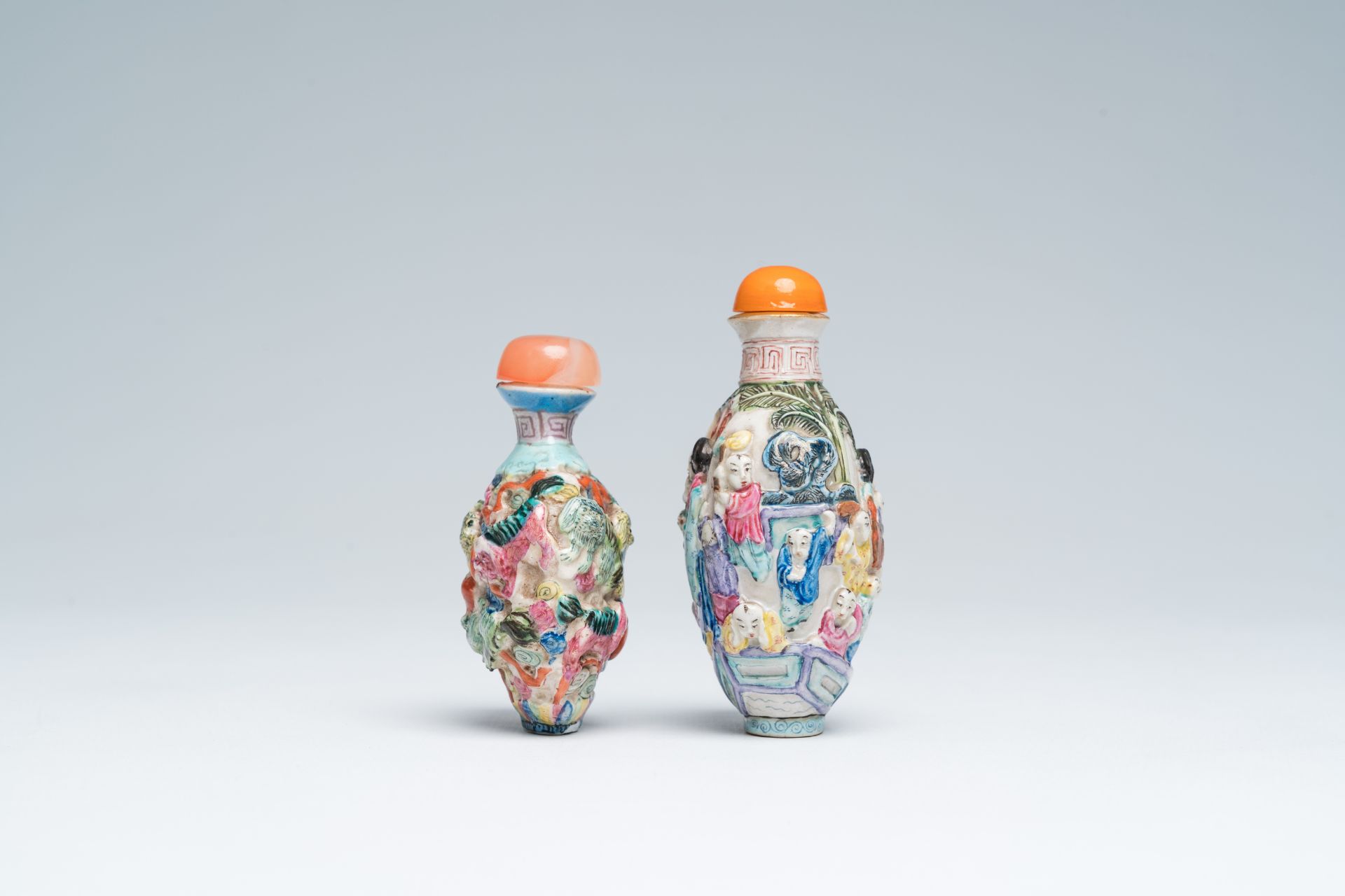 Two Chinese famille rose relief-molded snuff bottles, Qianlong mark, 19th C. - Image 4 of 6