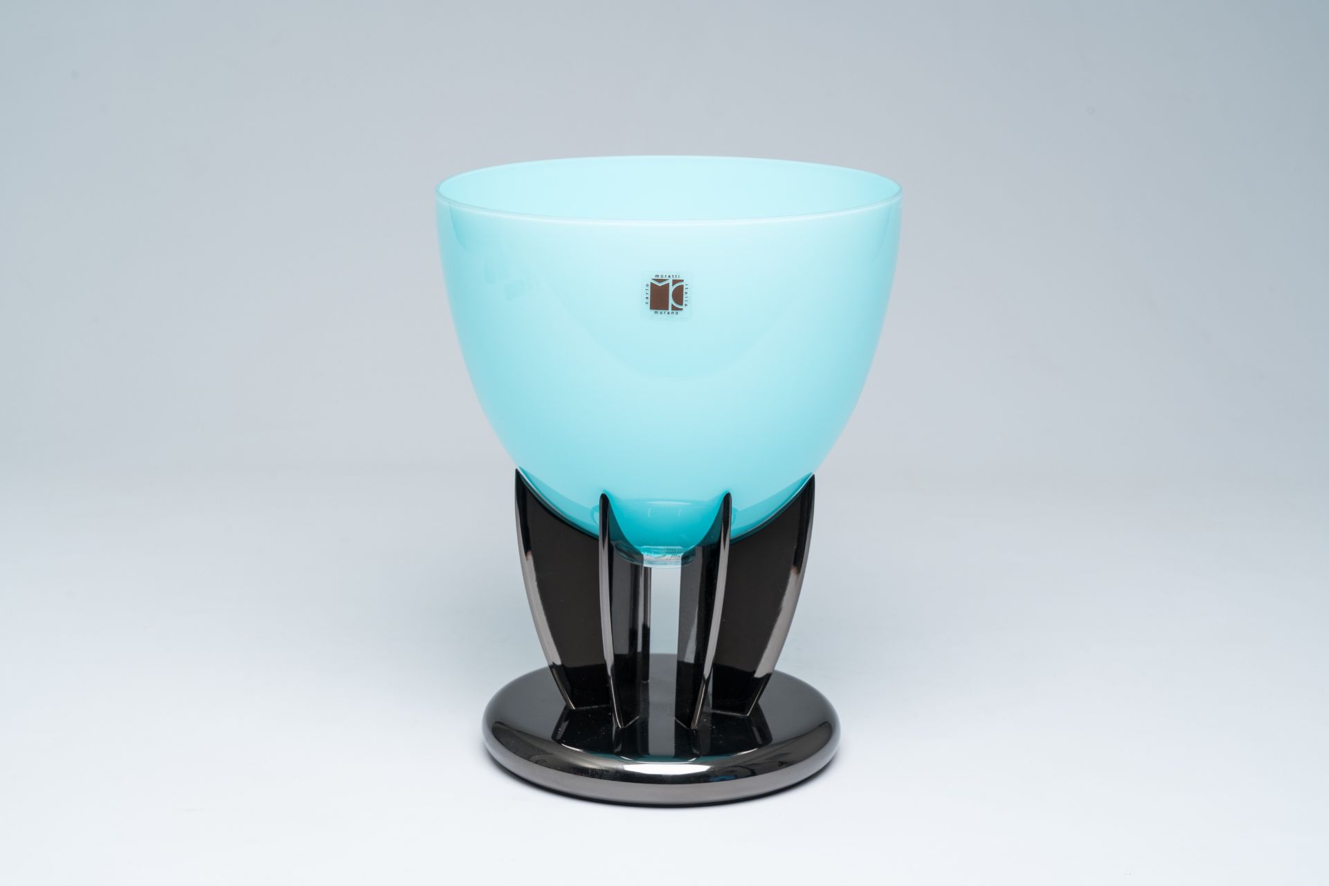 An Italian blue Murano glass fruit bowl on stand, Carlo Moretti, 2000s