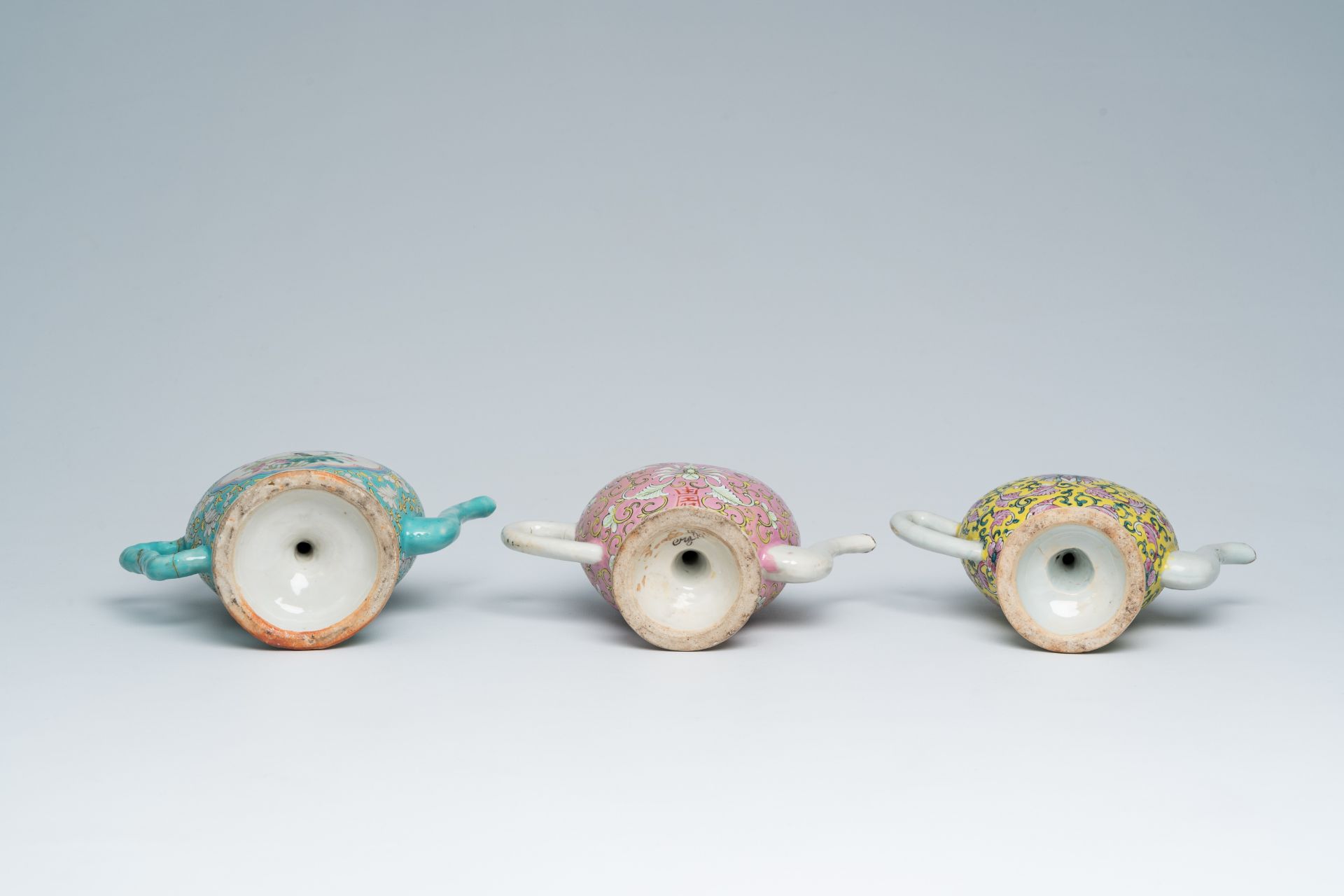 Three Chinese famille rose peach-shaped cadogan teapots with floral design, 19th C. - Image 7 of 7