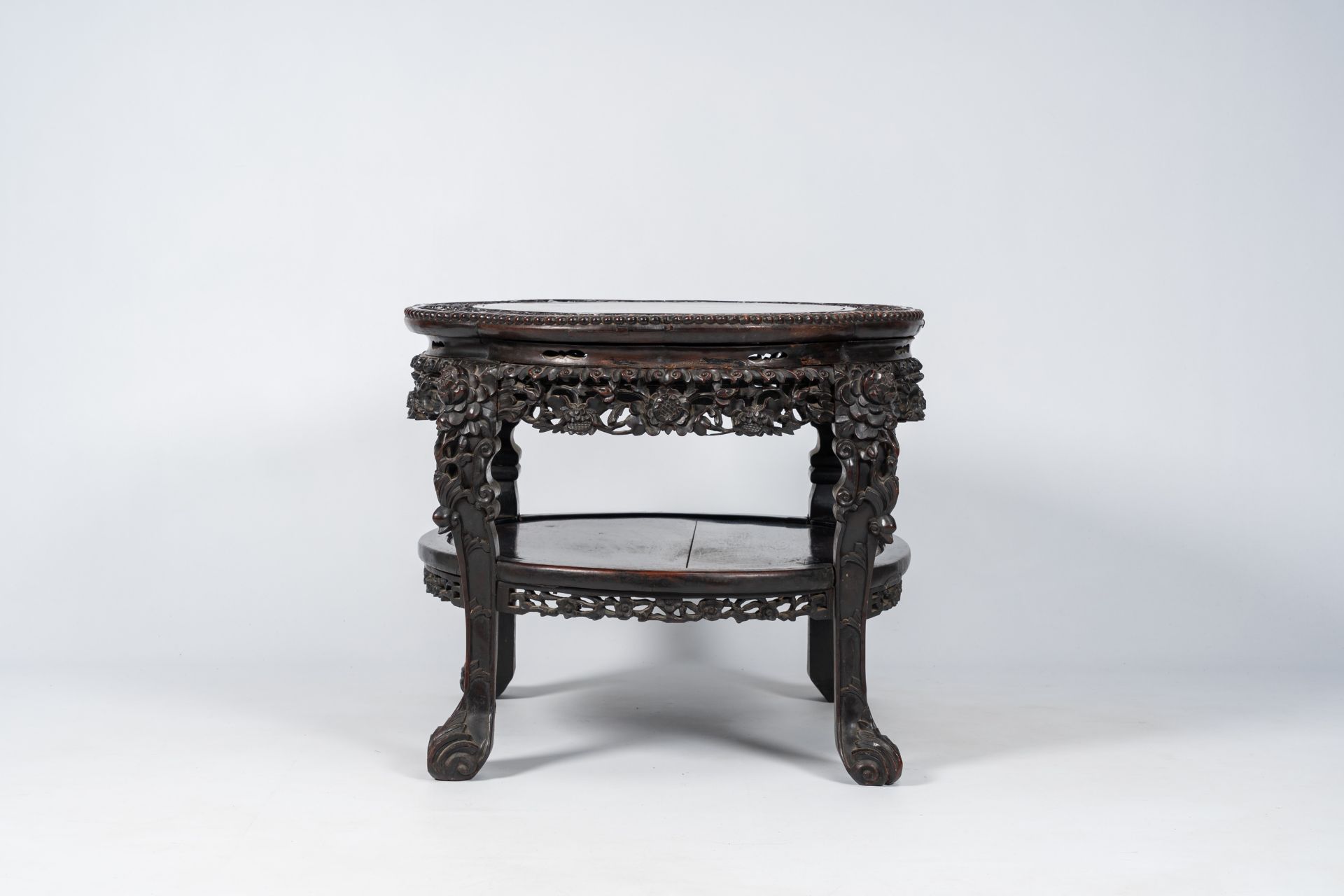 A Chinese richly carved hardwood table, 19th C. - Image 3 of 7