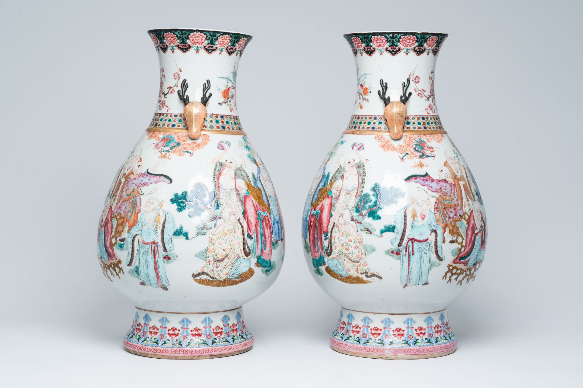 A pair of impressive Chinese famille rose 'hu' vases with the Eighteen Arhats or Luohans in a landsc - Image 4 of 13