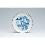 A Chinese blue and white Vietnamese market 'Bleu de Hue' dish with an animated river landscape, 19th