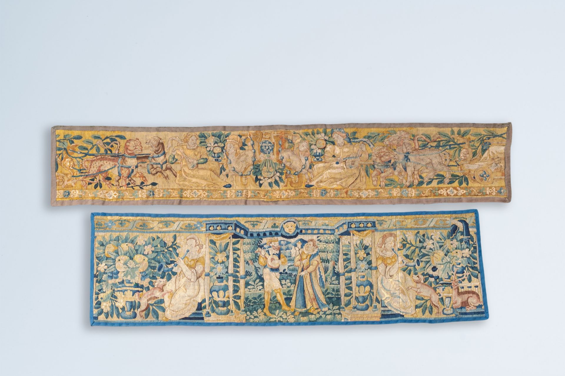 Two fragments of Flemish wall tapestries with musicians, 17th C.