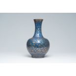 A Chinese blue ground gilt decorated 'bats amongst scrolling clouds' bottle vase, Guangxu mark and o
