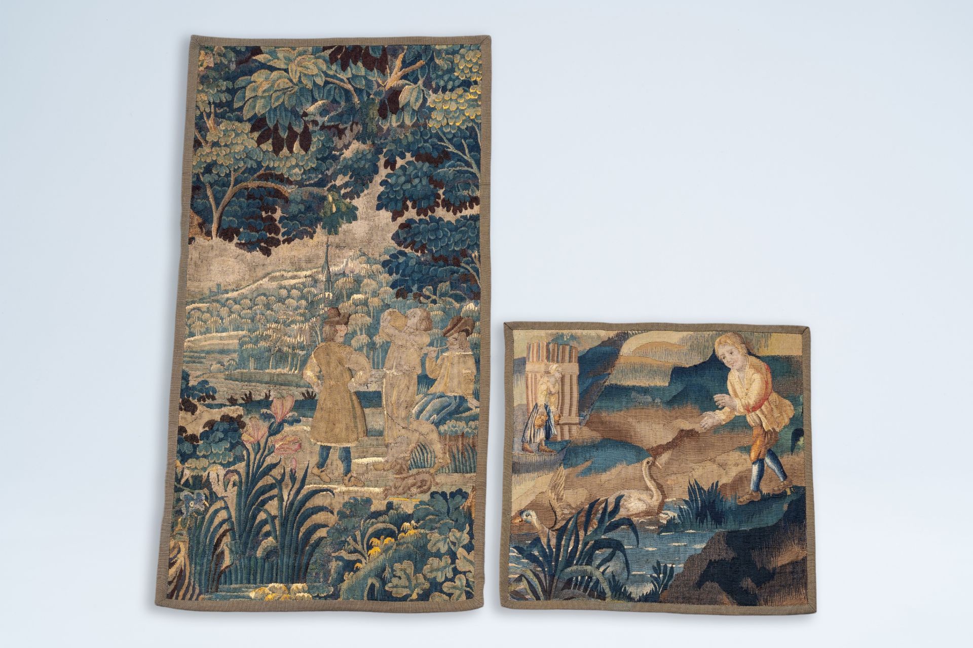 Two fragments of Flemish wall tapestries with bucolic scenes, 17th C.